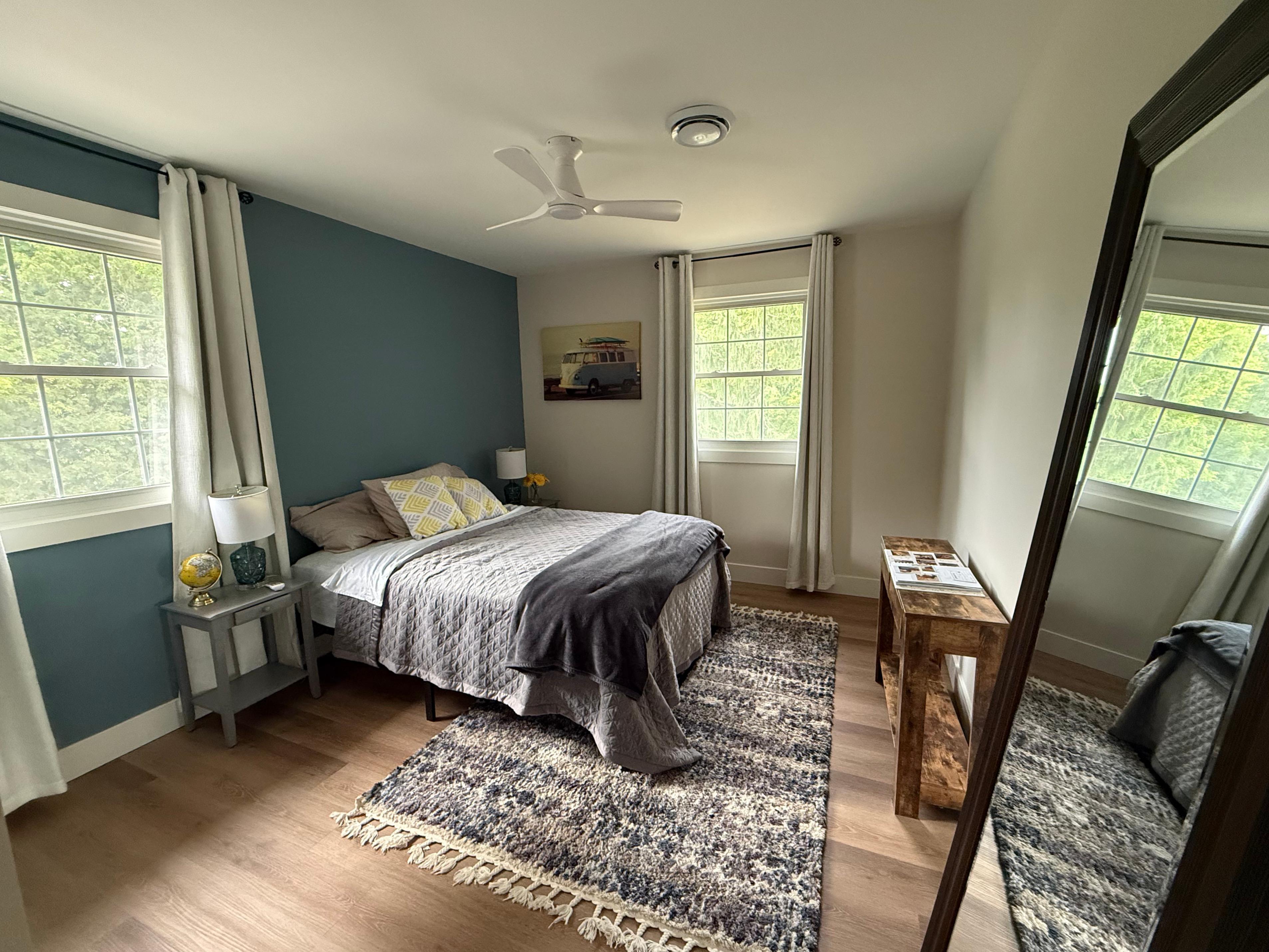 Modern bedroom with freshly painted accent wall